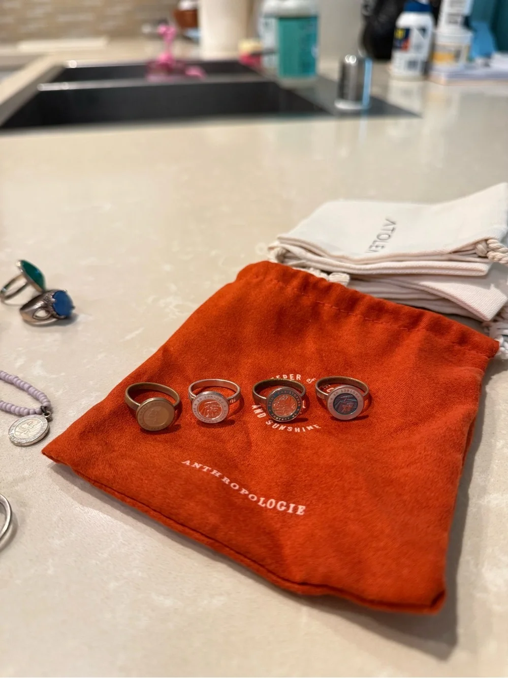 Anthropologie Stackable Coin Rings Set — Orange, Yellow, Blue, Gray